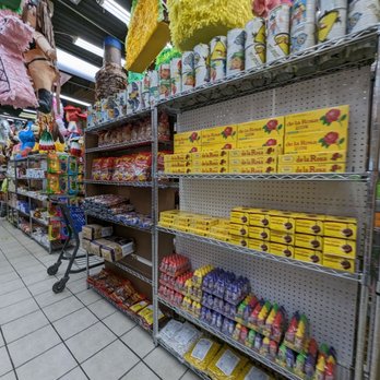 Candy Fruit - a grocery store aisle filled with candy and fruit - Candy Stores Near Me - El Paso, Texas