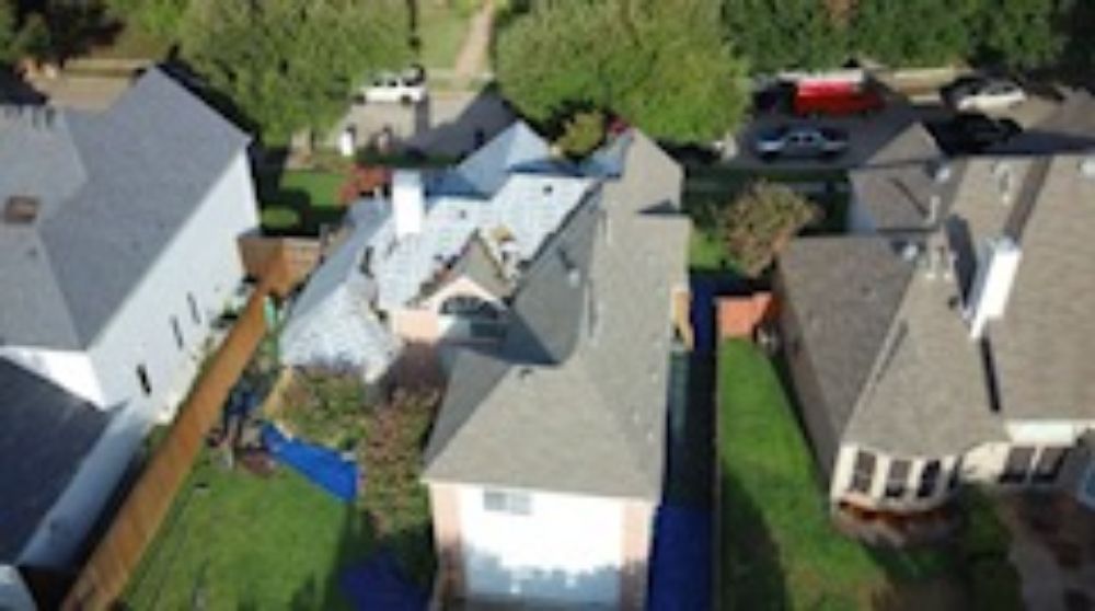 Slide of Ironclad Roofing & Restoration