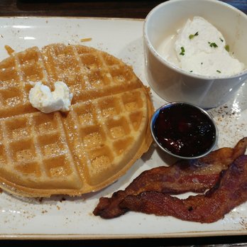 First Watch - Tri-Fecta with 2 poached eggs, Belgian waffle, and bacon - Breakfast & Brunch Near Me - Cary, North Carolina