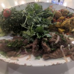 Lamb platter with lemon parsley salad, roasted vegetables, and tabbouleh Lamb platter with lemon parsley salad, roasted vegetables, and tabbouleh