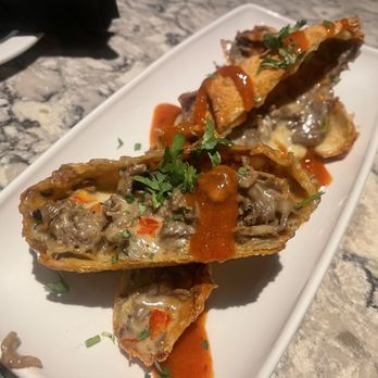 Firebirds Wood Fired Grill - Philly Cheesesteak Egg Rolls - American Near Me - Fort Worth, Texas Firebirds Wood Fired Grill - Philly Cheesesteak Egg Rolls - American Near Me - Fort Worth, Texas