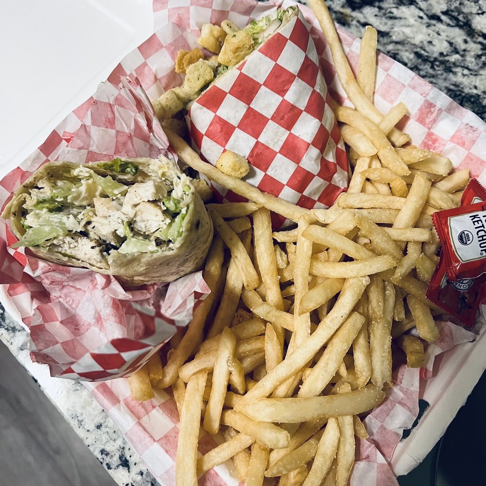 Surfside Bistro - Chicken Caesar salad in a garlic/herb tortilla wrap! Genius. - Delis Near Me - Florence, Oregon Surfside Bistro - Chicken Caesar salad in a garlic/herb tortilla wrap! Genius. - Delis Near Me - Florence, Oregon