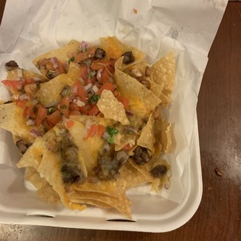 The Grid - Steak nachos with barely no steak or beans. - Pubs Near Me - Fallon, Nevada The Grid - Steak nachos with barely no steak or beans. - Pubs Near Me - Fallon, Nevada