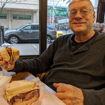 Domini Sandwiches - My husband enjoying the small beef and provolone sandwich. - Sandwiches Near Me - Spokane, Washington Domini Sandwiches - My husband enjoying the small beef and provolone sandwich. - Sandwiches Near Me - Spokane, Washington