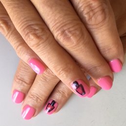 Pretty pink polish with tiny bottles of sparkly nail polish. Pretty pink polish with tiny bottles of sparkly nail polish.