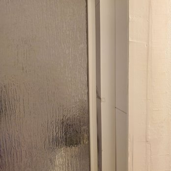 Illinois Remodeling Consultants - Door on the right also does not close all the way and the track is stuck - General Contractors Near Me Illinois Remodeling Consultants - Door on the right also does not close all the way and the track is stuck - General Contractors Near Me