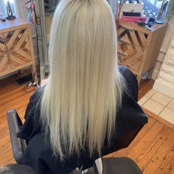 The Foundry Salon - Current hair. One metal bendy clip can hold it in a bun. Prior, it was so thick, not even a claw clip could hold it up.