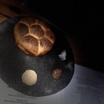Krüs Kitchen - Krüs Bread- sourdough w brown butter w anchovy, black garlic, and salt. - New American Near Me - Miami, Florida Krüs Kitchen - Krüs Bread- sourdough w brown butter w anchovy, black garlic, and salt. - New American Near Me - Miami, Florida