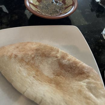 Phoenician Taverna - Free pita bread and oil dip - Mediterranean Near Me - Mason, Ohio Phoenician Taverna - Free pita bread and oil dip - Mediterranean Near Me - Mason, Ohio