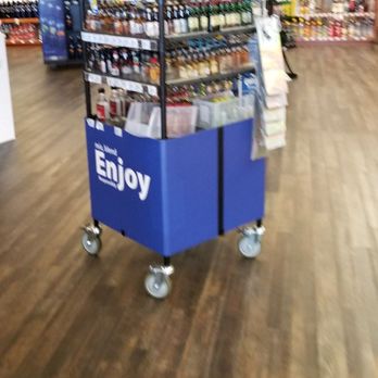 Liquor Store - a blue cart in a store - Beer, Wine & Spirits Near Me - Boise, Idaho Liquor Store - a blue cart in a store - Beer, Wine & Spirits Near Me - Boise, Idaho