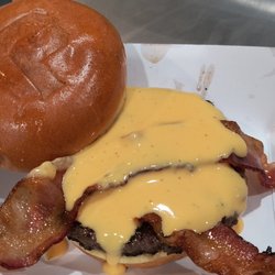 The Palomino - Beer Cheese, Moonshine BBQ Sauce, and Bacon on a juicy 1/2lb burger
