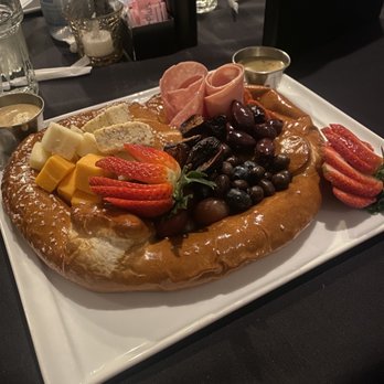 Stella's Restaurant & Catering - Charcuterie pretzel (There's a little bit of everything in there. Including chocolate covered coffee beans.) - Italian Near Me - Lubbock, Texas Stella's Restaurant & Catering - Charcuterie pretzel (There's a little bit of everything in there. Including chocolate covered coffee beans.) - Italian Near Me - Lubbock, Texas