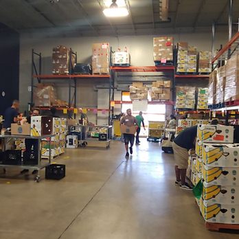 Feeding Northeast Florida - Inspectors check expiration dates. Good items placed in front of table and sorters put items in the appropriate box for distribution. - Food Banks Near Me - Jacksonville, Florida Feeding Northeast Florida - Inspectors check expiration dates. Good items placed in front of table and sorters put items in the appropriate box for distribution. - Food Banks Near Me - Jacksonville, Florida