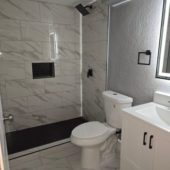 Dynamic Contractors - A beautifully renovated bathroom brings a sense of calm and serenity to your daily routine. - General Contractors Near Me Dynamic Contractors - A beautifully renovated bathroom brings a sense of calm and serenity to your daily routine. - General Contractors Near Me
