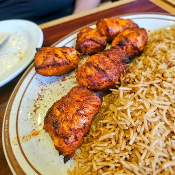 Dunya Kabab House - Spicy Chicken Kabob. $17. With standard rice instead of Qabuli Pulao because "reasons." Very tender and juicy - Afghan Near Me - Brooklyn, New York