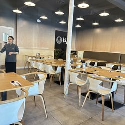 A.Bento - Uniformed servers, light wood, curved chairs, pendant lights