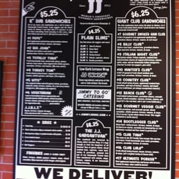 a menu on a brick wall a menu on a brick wall
