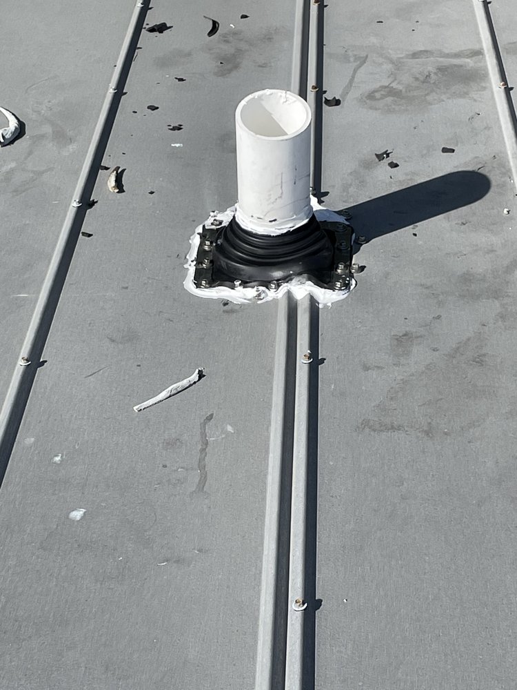 Slide of Andy The Roofer & Co