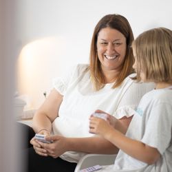 Kingsland Osteo - Comforting words and gentle touch can make a world of difference. Kristi connecting with her young patient during a treatment session.