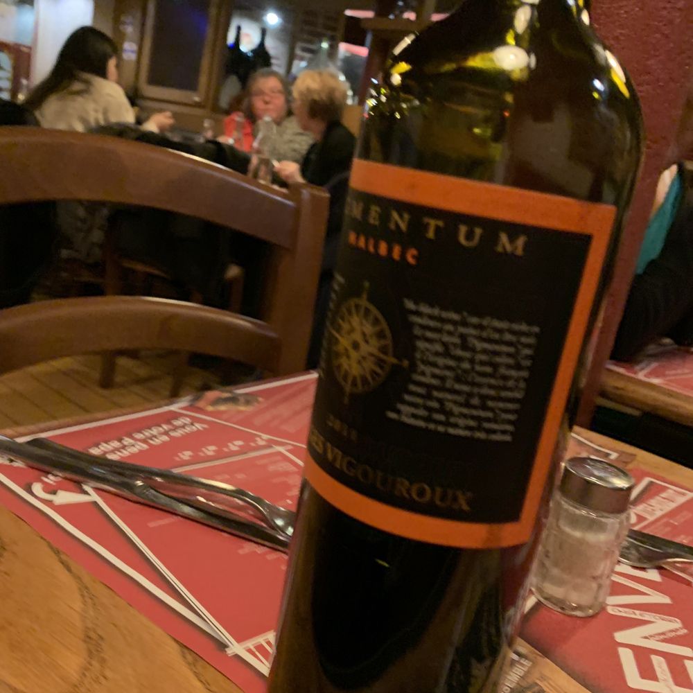 Chez Papa - Bottle of wine on the other table because it was less shaky - French Near Me - Paris, 75 Chez Papa - Bottle of wine on the other table because it was less shaky - French Near Me - Paris, 75