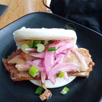 Silverlake Ramen - Another shot of pork bun, the pickled onions adds zest and balance the soy-sauce saltiness of the pork - Ramen Near Me - Kirkland, Washington Silverlake Ramen - Another shot of pork bun, the pickled onions adds zest and balance the soy-sauce saltiness of the pork - Ramen Near Me - Kirkland, Washington