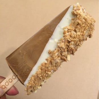 Popbar - Coffee dipped in white chocolate with waffle crisp and almonds - Desserts Near Me - Anaheim, California Popbar - Coffee dipped in white chocolate with waffle crisp and almonds - Desserts Near Me - Anaheim, California
