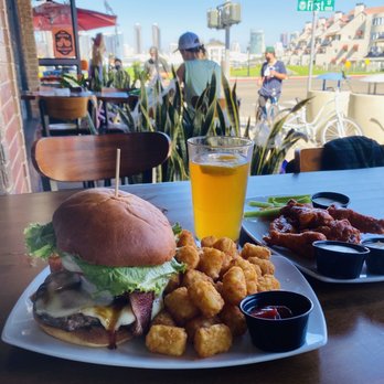 Nicky Rottens - Pineapple and Bacon Cheeseburger with Tots. Extra hot wings, on the side. DELISH - Sports Bars Near Me - Coronado, California Nicky Rottens - Pineapple and Bacon Cheeseburger with Tots. Extra hot wings, on the side. DELISH - Sports Bars Near Me - Coronado, California