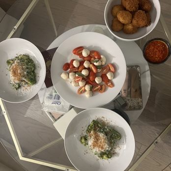 Cozymeal - Potato gnocchi from scratch with pesto, caprese salad, and fresh Arancini - Cooking Classes Near Me - New York, New York Cozymeal - Potato gnocchi from scratch with pesto, caprese salad, and fresh Arancini - Cooking Classes Near Me - New York, New York