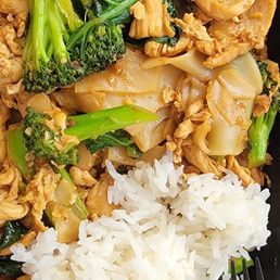 Phad See Lew - rice noodles stir-fried in soy sauce with scrambled eggs, 'merican broccoli & chinese broccoli + side of jasmine rice. Phad See Lew - rice noodles stir-fried in soy sauce with scrambled eggs, 'merican broccoli & chinese broccoli + side of jasmine rice.