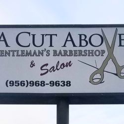 A Cut Above Barbershop and Salon - Sign