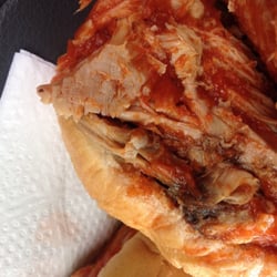Fossie Bar-B-Que - Pulled pork sandwich on white buns.