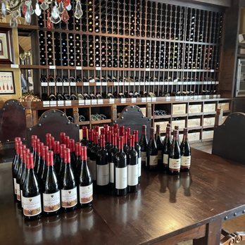 Wine Shoe - rows of wine bottles on a table - Beer, Wine & Spirits Near Me - Atlanta, Georgia