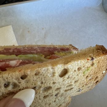 Rubicon Deli - Some cross contamination of something spicy see the red on the bread I'm guessing from the same knife to slice another sandwich - Delis Near Me - Reno, Nevada Rubicon Deli - Some cross contamination of something spicy see the red on the bread I'm guessing from the same knife to slice another sandwich - Delis Near Me - Reno, Nevada
