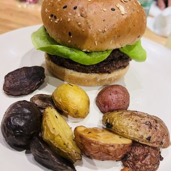 True Food Kitchen - Vegan burger with potatoes - New American Near Me - Austin, Texas True Food Kitchen - Vegan burger with potatoes - New American Near Me - Austin, Texas