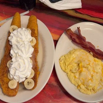 Abracadabra's - Captain Crunch encrusted French toast with cheese eggs & bacon - Breakfast & Brunch Near Me - Idaho Falls, Idaho Abracadabra's - Captain Crunch encrusted French toast with cheese eggs & bacon - Breakfast & Brunch Near Me - Idaho Falls, Idaho