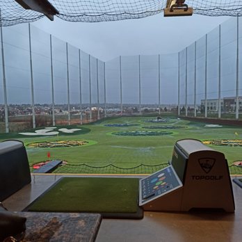 Topgolf - It's raining! - New American Near Me - Centennial, Colorado