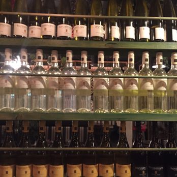 Cafe Amore - a shelf full of wine bottles - Italian Near Me - St Catharines, Ontario Cafe Amore - a shelf full of wine bottles - Italian Near Me - St Catharines, Ontario
