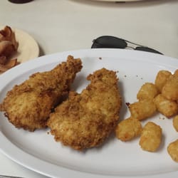 Clenney's Grill - Chicken strip platter with tater tots and a side of pork jowl.