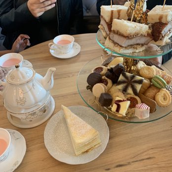 Proper Rose Garden - Rose milk tea, tiered tray with konkatsu sandwich and vanilla crepe cake - Themed Cafes Near Me - Katy, Texas