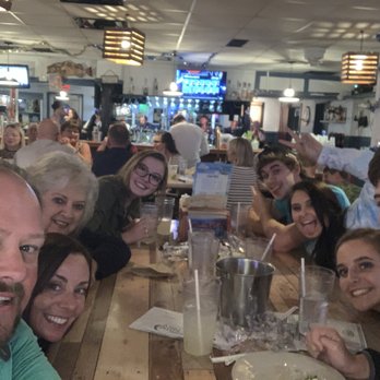 Crabby Bill's - The clan enjoying the sea food - Seafood Near Me - Indian Rocks Beach, Florida