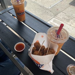 thai tea with mild popcorn chicken and sweet siracha sauce