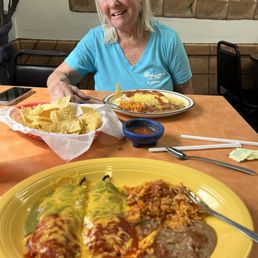 my chilies Renos plate in the foreground and Pat's border burrito in front of her. Homemade chips and salsa to die for in the middle. my chilies Renos plate in the foreground and Pat's border burrito in front of her. Homemade chips and salsa to die for in the middle.