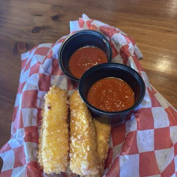 Nonno's - Mozz Sticks with side of spicy marinara and regular marinara - Pizza Near Me - Houston, Texas Nonno's - Mozz Sticks with side of spicy marinara and regular marinara - Pizza Near Me - Houston, Texas