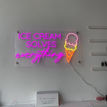Moody Cows - a neon sign that says ice cream solves everything - Food Trucks Near Me - London, Kentucky