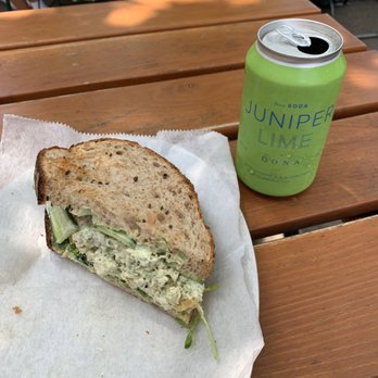 Tatte Bakery & Cafe | Beacon St - Herbed chicken salad sandwich with marinated cucumber and English pea shoots, accompanied by a Juniper Lime soda - Bakeries Near Me - Brookline, Massachusetts Tatte Bakery & Cafe | Beacon St - Herbed chicken salad sandwich with marinated cucumber and English pea shoots, accompanied by a Juniper Lime soda - Bakeries Near Me - Brookline, Massachusetts