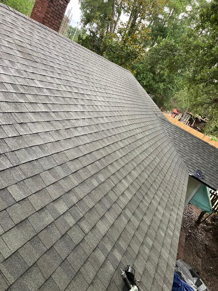 Slide of Payless Roofing