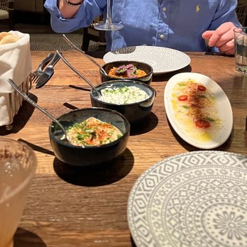 Del Mar Naples - Starters: hummus, spicy feta, tzatziki, snapper crudo with olive oil (delicious!) - Seafood Near Me - Naples, Florida