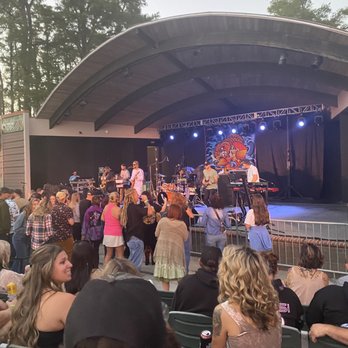 Greenfield Lake Amphitheater - a band performing on stage - Performing Arts Near Me - Wilmington, North Carolina Greenfield Lake Amphitheater - a band performing on stage - Performing Arts Near Me - Wilmington, North Carolina