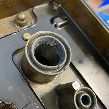 723 Automotive and Diesel - Busted gasket cover from work that was completed at this shop. The cover was busted by coil replacement and then was covered up! - Auto Repair Near Me - Rosenberg, Texas 723 Automotive and Diesel - Busted gasket cover from work that was completed at this shop. The cover was busted by coil replacement and then was covered up! - Auto Repair Near Me - Rosenberg, Texas