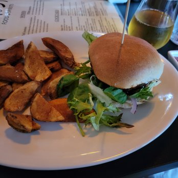 Cafe 59 - The Burgundy Burger (cooked medium) with potato wedges and a "Let's Go Pil's!" - Bars Near Me - Buffalo, New York